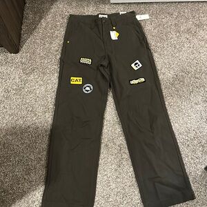 CAT UO exclusive patched carpenter pant